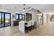 Kitchen island with white marble countertop and stunning mountain views at 8200 N Charles Dr, Paradise Valley, AZ 85253