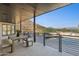 Covered patio with seating area overlooking the pool at 8200 N Charles Dr, Paradise Valley, AZ 85253