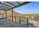 Pergola with mountain views and a pool below at 8200 N Charles Dr, Paradise Valley, AZ 85253