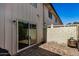 Private patio with sliding glass door access, tile flooring, and a fire pit at 8241 N Central Ave # 32, Phoenix, AZ 85020