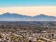 Distant mountain views and cityscape in background at 8766 W Desert Trl, Peoria, AZ 85381