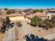 Aerial view of house, double garage, and neighborhood at 8766 W Desert Trl, Peoria, AZ 85381