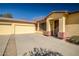 Front view of house, double garage, and entrance at 8766 W Desert Trl, Peoria, AZ 85381