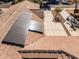 Solar panels installed on the brown tile roof of the house at 8766 W Desert Trl, Peoria, AZ 85381