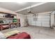 Garage with shelving and additional storage space at 8841 W Cordes Rd, Tolleson, AZ 85353