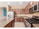 Kitchen features stainless steel appliances and ample counter space at 8841 W Cordes Rd, Tolleson, AZ 85353