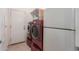 Laundry room with washer, dryer, and extra storage at 8841 W Cordes Rd, Tolleson, AZ 85353