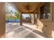 Covered patio with ceiling fan, overlooking the pool area at 8841 W Cordes Rd, Tolleson, AZ 85353