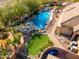 Luxury backyard with a large pool and waterfall feature at 9535 E Mclellan Rd, Mesa, AZ 85207