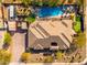 Luxury home with a large backyard, pool, and playground at 9535 E Mclellan Rd, Mesa, AZ 85207