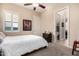 Spacious bedroom with ensuite bathroom access and large window at 9535 E Mclellan Rd, Mesa, AZ 85207