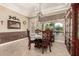 Bright breakfast nook with wood-look flooring and built-ins at 9535 E Mclellan Rd, Mesa, AZ 85207