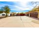 Landscaped backyard with covered patio at 9535 E Mclellan Rd, Mesa, AZ 85207