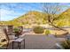 Landscaped front yard with mountain views and brick paving at 9535 E Mclellan Rd, Mesa, AZ 85207