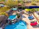 Resort-style backyard oasis with a large pool, spa, and patio at 9535 E Mclellan Rd, Mesa, AZ 85207