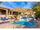 Expansive pool and spa with lounge chairs and mountain views at 9535 E Mclellan Rd, Mesa, AZ 85207