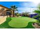 Private putting green in the backyard at 9535 E Mclellan Rd, Mesa, AZ 85207