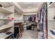 Large walk-in closet with ample shelving and hanging space at 9535 E Mclellan Rd, Mesa, AZ 85207