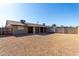 Spacious backyard with gravel and covered patio at 9676 W Mountain View Rd # B, Peoria, AZ 85345