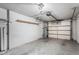 Attached garage with overhead door and storage shelving at 9676 W Mountain View Rd # B, Peoria, AZ 85345