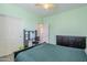 Bedroom with a double bed, dresser, and ceiling fan at 10406 E Laguna Azul Ave, Mesa, AZ 85209