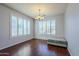 Bright dining room with hardwood floors and a chandelier at 10406 E Laguna Azul Ave, Mesa, AZ 85209