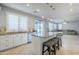 Kitchen with island, stainless steel appliances, and white cabinetry at 10406 E Laguna Azul Ave, Mesa, AZ 85209