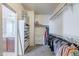 Large walk-in closet with ample shelving and hanging space at 10406 E Laguna Azul Ave, Mesa, AZ 85209