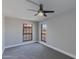 Bright bedroom with neutral walls and large windows at 10410 N Cave Creek Rd # 2011, Phoenix, AZ 85020