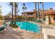 Inviting community pool with lounge chairs at 10410 N Cave Creek Rd # 2011, Phoenix, AZ 85020