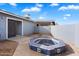 Spacious backyard with a tiled hot tub at 1120 E Kael Cir, Mesa, AZ 85203