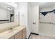 Main bathroom with walk-in shower and single vanity at 1120 E Kael Cir, Mesa, AZ 85203