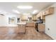 Kitchen with island, stainless steel appliances, and tile floor at 1120 E Kael Cir, Mesa, AZ 85203