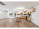 Kitchen with island, stainless steel appliances, and tile floor at 1120 E Kael Cir, Mesa, AZ 85203