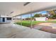 Covered patio overlooks the backyard with a large workshop at 1120 E Kael Cir, Mesa, AZ 85203