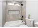 Updated bathroom with a bathtub, shower, and modern vanity at 11225 S Tomah St, Phoenix, AZ 85044