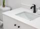 Modern bathroom vanity with a white countertop and black faucet at 11225 S Tomah St, Phoenix, AZ 85044