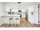 Modern white kitchen with stainless steel appliances at 11225 S Tomah St, Phoenix, AZ 85044