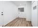 Bright laundry room with vinyl flooring and cabinets at 11225 S Tomah St, Phoenix, AZ 85044