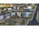 Aerial view of a house with a pool and solar panels, highlighting key features at 12 E Foothill Dr, Phoenix, AZ 85020