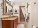 Bathroom boasts granite vanity and a shower at 12 E Foothill Dr, Phoenix, AZ 85020