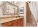 Bathroom with granite vanity and a shower at 12 E Foothill Dr, Phoenix, AZ 85020