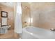 Bathroom features a large bathtub and tile surround at 12 E Foothill Dr, Phoenix, AZ 85020