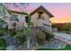 Modern house exterior featuring a unique design, landscaping, and mountain views at 12 E Foothill Dr, Phoenix, AZ 85020