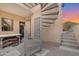 Outdoor patio with spiral staircase and seating area at 12 E Foothill Dr, Phoenix, AZ 85020