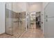 Large walk-in shower with glass enclosure and modern fixtures at 12657 N 135Th St, Scottsdale, AZ 85259