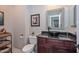 Elegant bathroom with dark wood vanity and black vessel sink at 12657 N 135Th St, Scottsdale, AZ 85259