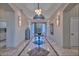 Spacious entryway with marble flooring, a large chandelier, and a console table at 12657 N 135Th St, Scottsdale, AZ 85259