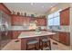 Island kitchen with stainless steel appliances and granite countertops at 12657 N 135Th St, Scottsdale, AZ 85259