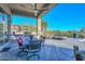 Covered patio with dining area, grill, and spa at 12657 N 135Th St, Scottsdale, AZ 85259